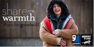 A woman bundled in warm coats laughs A woman bundled in warm coats laughs