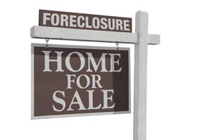 "For Sale" and "Foreclosure" signs