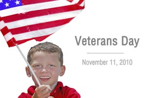 A boy waving the American flag