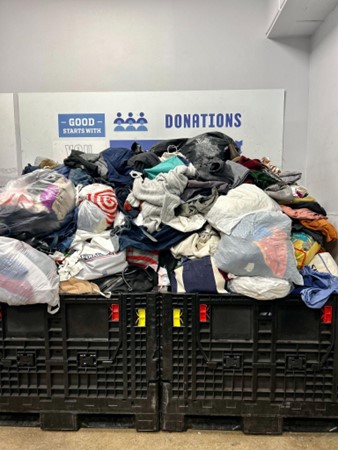 A bin full of donated clothes